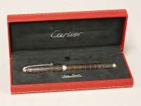 Lot 42 - A Cartier Limited Edition Louis Dandy ebony and crocodile fountain pen