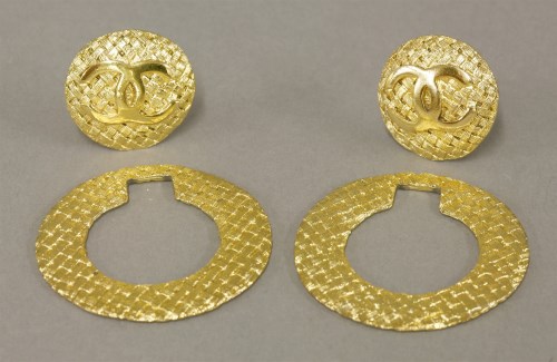 Lot 26 - A pair of gold-plated Chanel woven design hoop clip-on earrings (2)