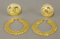 Lot 26 - A pair of gold-plated Chanel woven design hoop clip-on earrings (2)