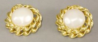 Lot 27 - A pair of vintage gold-plated Chanel simulated pearl and twisted rope clip-on earrings (2)