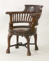 Lot 1562 - A late Victorian mahogany revolving desk chair