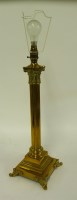 Lot 1209 - A brass Corinthian column electric table lamp