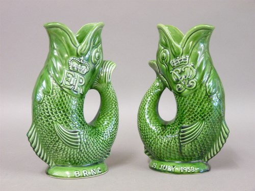 Lot 1067 - A pair of rare Dartmouth Devon gurgle jugs