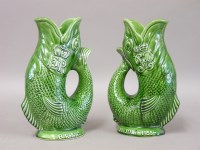 Lot 1067 - A pair of rare Dartmouth Devon gurgle jugs