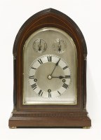 Lot 1327 - An Edwardian strung mahogany mantel clock