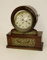 Lot 1323 - A Regency rosewood and brass inlaid mantel clock