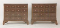 Lot 1569 - A pair of walnut and feather strung chests