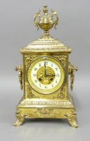 Lot 1322 - A Victorian gilt brass mantel clock