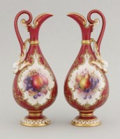 Lot 1088 - A pair of Royal Worcester ewers