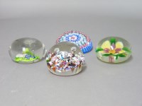 Lot 1136 - Four glass paperweights