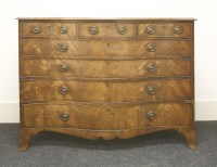 Lot 1610 - A large serpentine mahogany commode