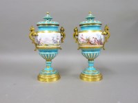 Lot 1114 - A pair of Minton style vases