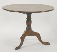 Lot 1500 - A George III mahogany tilt top table