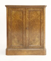 Lot 1627 - A Victorian burr walnut two door cupboard