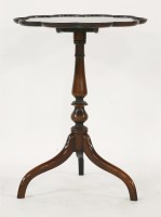 Lot 1544 - A Georgian style mahogany lamp table