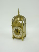 Lot 1319 - A reproduction brass lantern clock