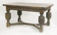 Lot 1575 - An oak drawleaf dining table