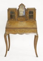 Lot 1659 - A Victorian Louis XV style walnut and inlaid bonheur de jour