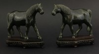 Lot 166 - A pair of spinach-green jade Horses