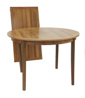 Lot 561 - A rosewood circular dining table