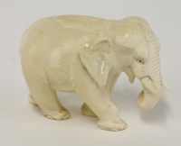 Lot 69 - An ivory model elephant