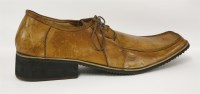 Lot 96 - A large display shoe in brown leather