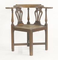 Lot 588 - A George III mahogany corner or desk chair