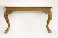 Lot 564 - A carved and gilt console table