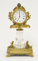 Lot 379 - A Palais Royale rock crystal and ormolu desk timepiece