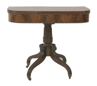 Lot 556 - A George III mahogany fold-over tea table