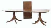 Lot 549 - A George III mahogany twin pedestal dining table