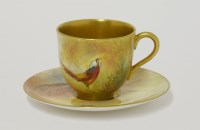 Lot 119 - A Royal Worcester cabinet cup and saucer
