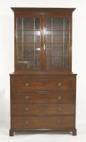 Lot 1465 - A George III mahogany secretaire bookcase