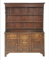 Lot 1428 - A George III oak dresser