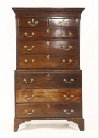 Lot 1461 - A George III mahogany secretaire chest on chest