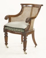 Lot 1662 - An early 19th century mahogany framed bergère chair