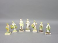 Lot 1107 - Seven early 19th century Staffordshire figures of putti