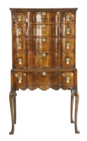 Lot 1597 - An early 20th century walnut chest on stand