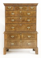 Lot 572 - A walnut chest on chest