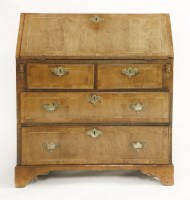 Lot 573 - A walnut bureau