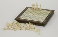 Lot 166 - An Anglo-Indian rosewood and ivory folding travelling chessboard