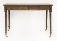 Lot 583 - A walnut writing table