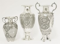 Lot 26 - Three Persian silver/metalwares vases