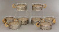 Lot 191 - Eight German Art Deco silver-plated and glass cups
