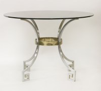 Lot 660 - A chrome and glass table