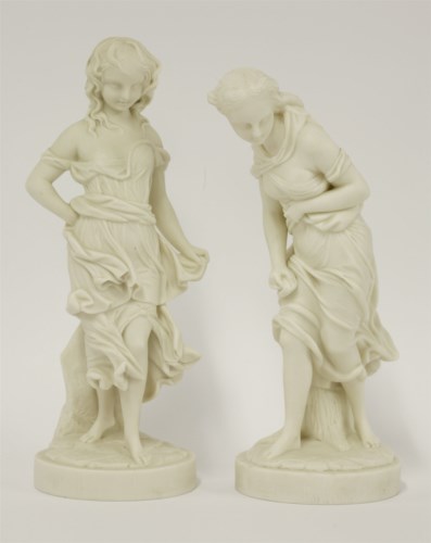 Lot 209 - A pair of Royal Worcester parian ware figures
