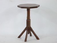 Lot 612 - An unusual Victorian walnut octagonal lamp table