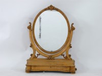 Lot 649 - An early Victorian bird's-eye maple toilet mirror