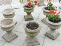 Lot 785 - Three pairs of reconstituted stone garden urns