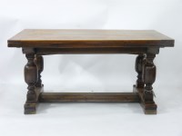 Lot 641 - A 20th century refectory style drawer leaf table